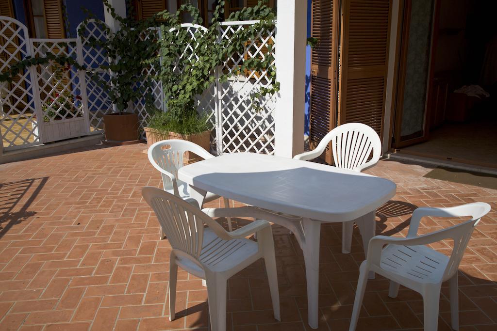 Amarenumana Aparthotel Habitación foto
