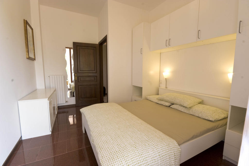 Amarenumana Aparthotel Habitación foto