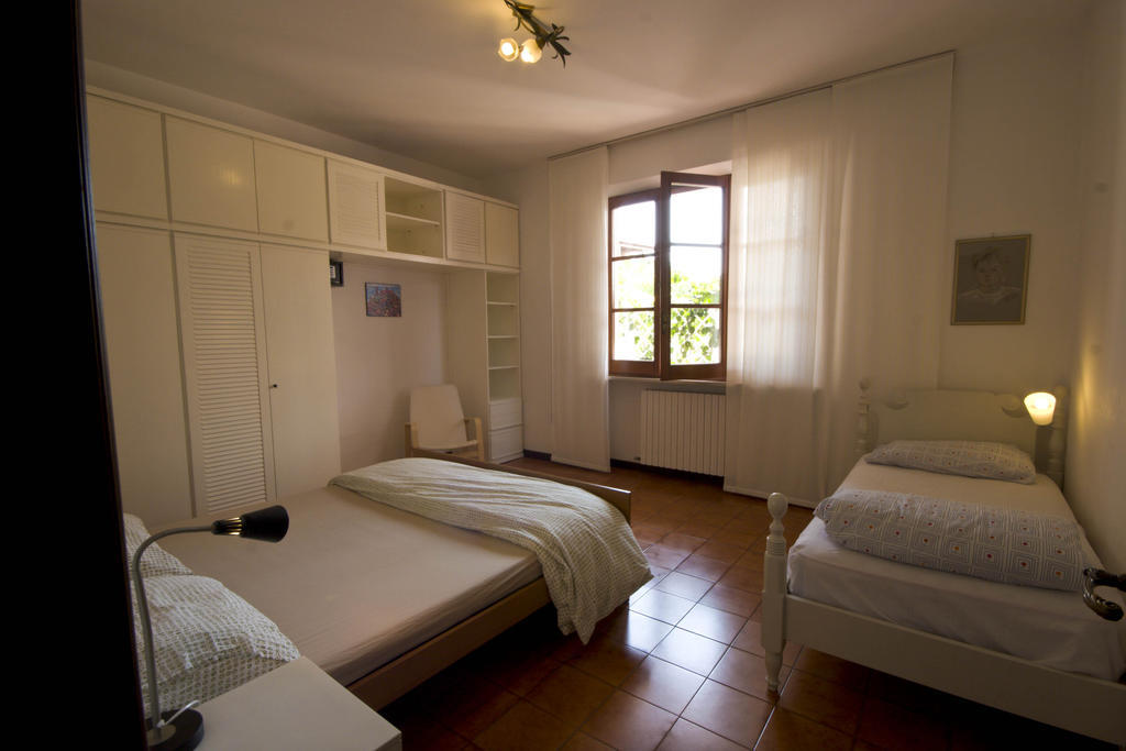 Amarenumana Aparthotel Habitación foto