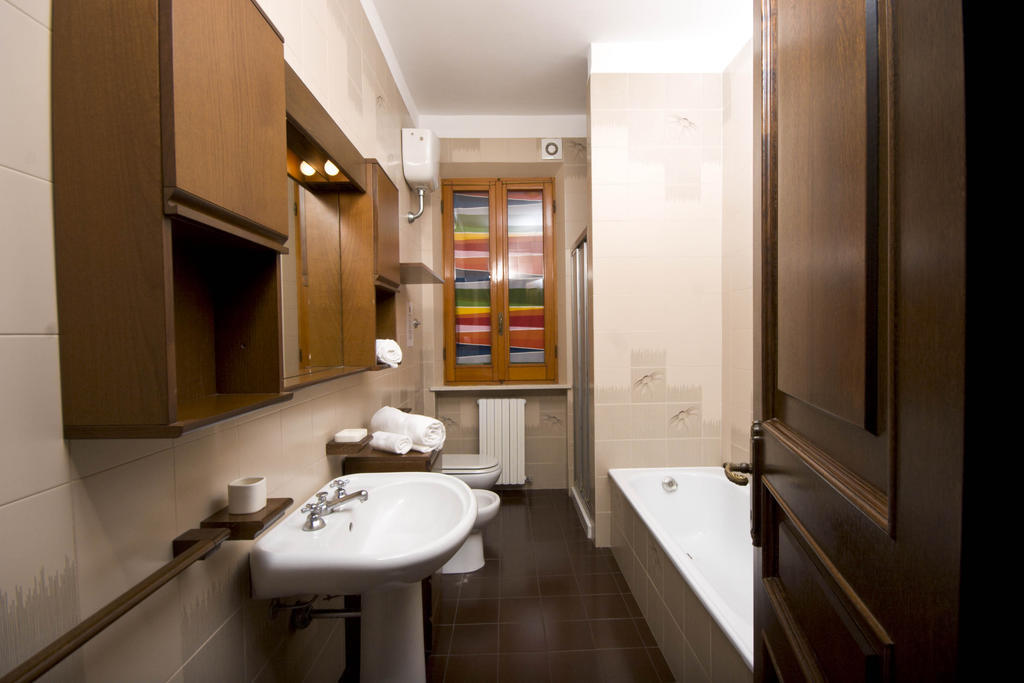 Amarenumana Aparthotel Habitación foto
