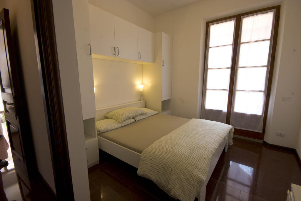 Amarenumana Aparthotel Habitación foto