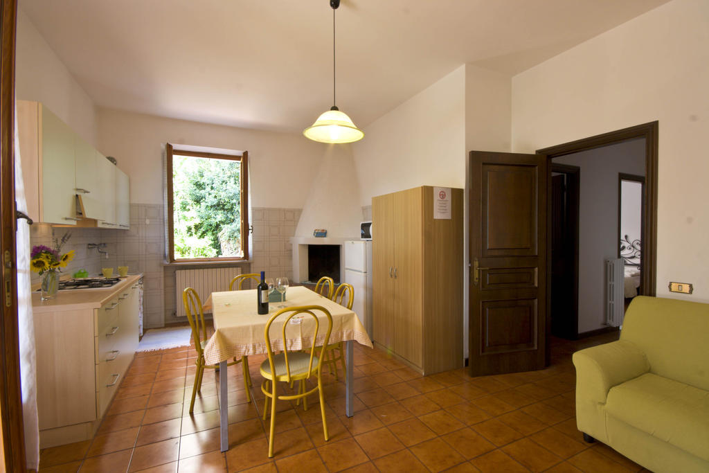 Amarenumana Aparthotel Habitación foto
