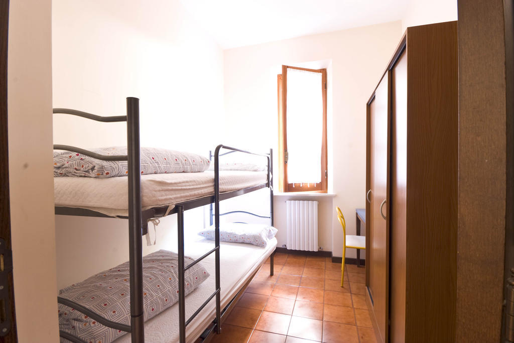 Amarenumana Aparthotel Habitación foto